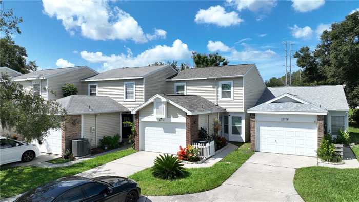 photo 1: 2277 ABBEY LANE Unit E, PALM HARBOR FL 34683