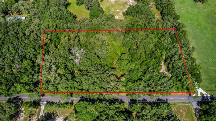 photo 1: 37215 ROLLING ACRES ROAD, LADY LAKE FL 32159