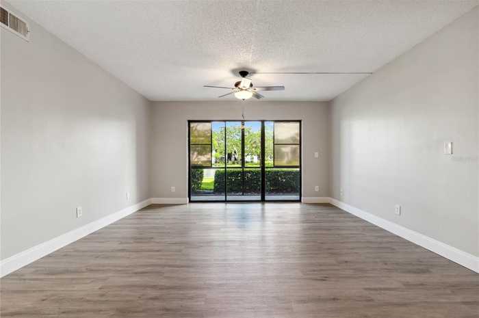 photo 2: 1017 S PINE RIDGE CIR, SANFORD FL 32773