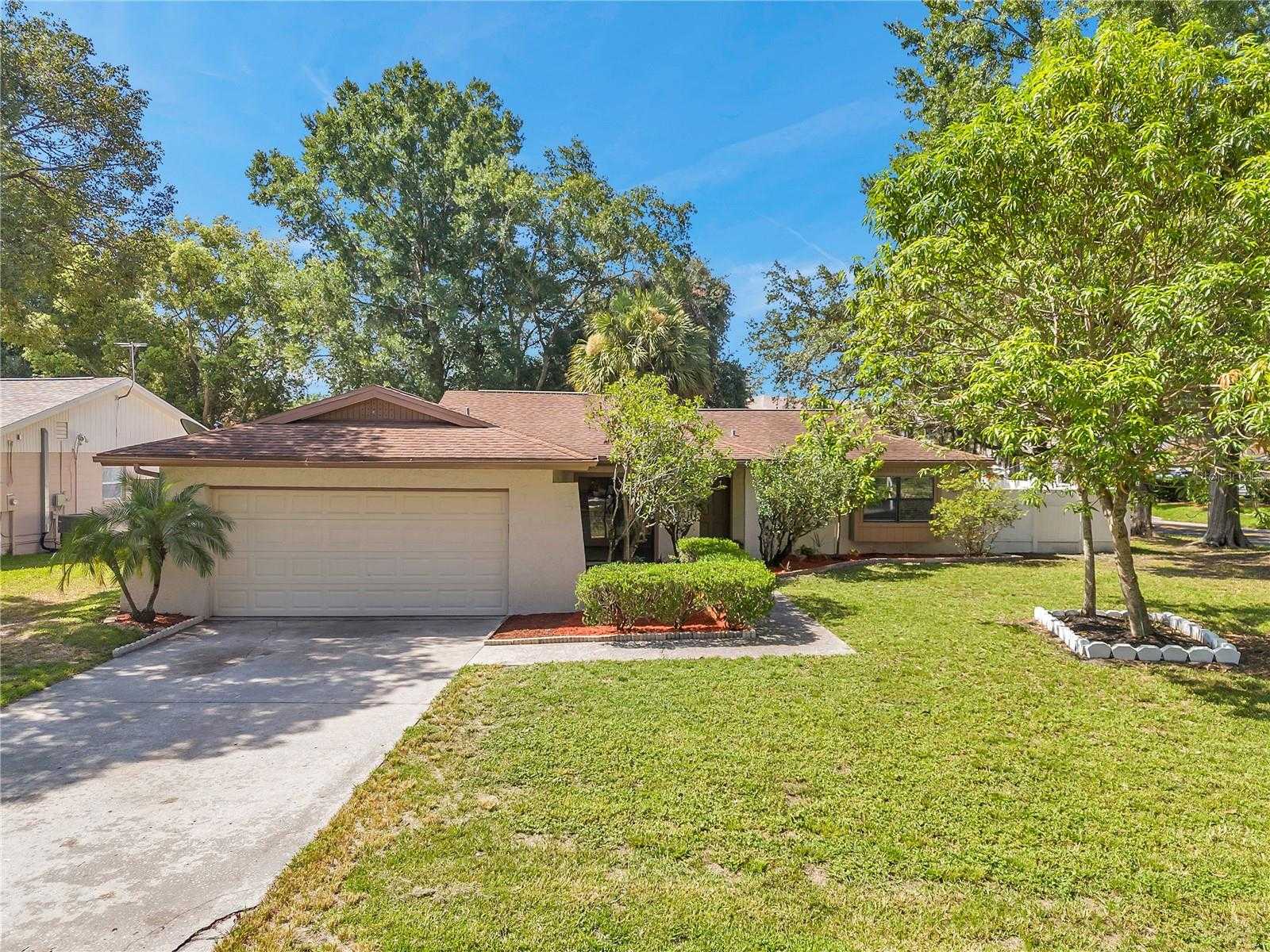 photo 1: 9036 HOGANS BEND AVENUE, TAMPA FL 33647