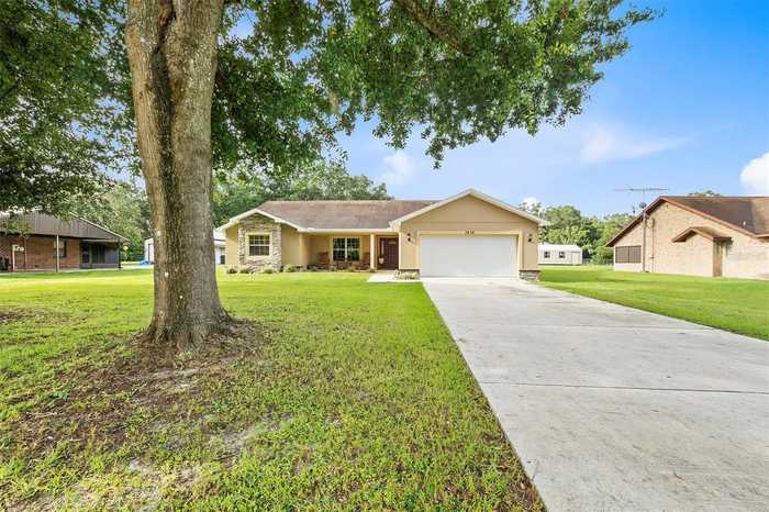 photo 2: 1618 LEHALL SQUARE N, LAKELAND FL 33810