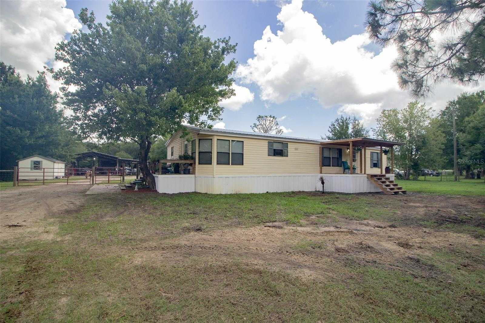 photo 3: 10211 OLD SPANISH TRAIL, POLK CITY FL 33868