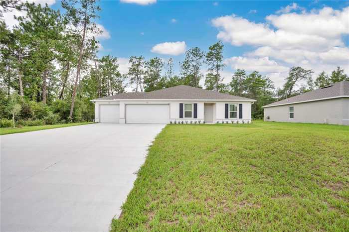 photo 1: 611 MARION OAKS BOULEVARD, OCALA FL 34473