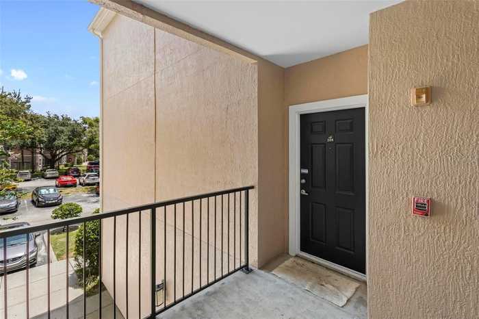 photo 1: 3250 CORONA VILLAGE WAY Unit 205, ORLANDO FL 32835