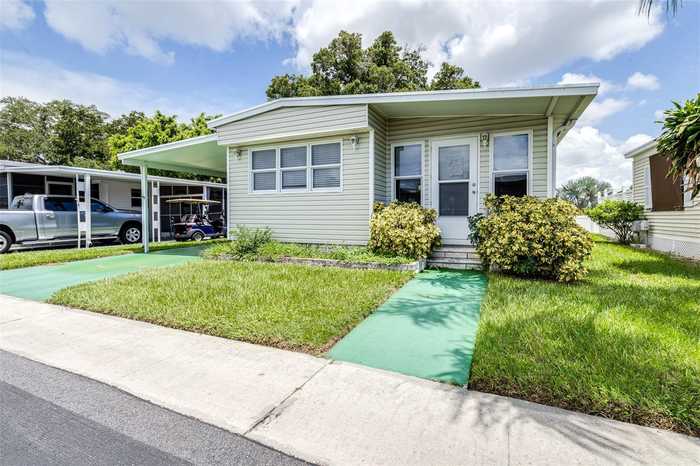 photo 1: 1500 COUNTY ROAD 1 Unit 234, DUNEDIN FL 34698