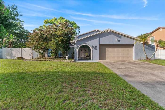 photo 1: 8019 GREENSHIRE DR, TAMPA FL 33634