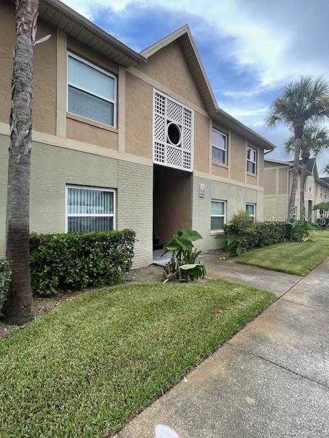 photo 1: 9817 TURF WAY Unit 8, ORLANDO FL 32837