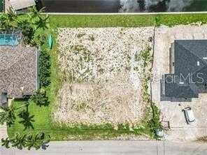 photo 2: 2521 NW 41ST AVENUE, CAPE CORAL FL 33993