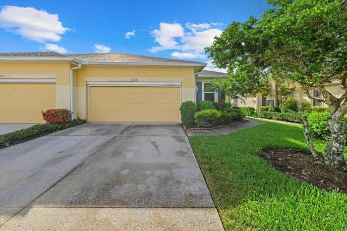 photo 1: 1223 FAIRWAY GREENS DRIVE, SUN CITY CENTER FL 33573