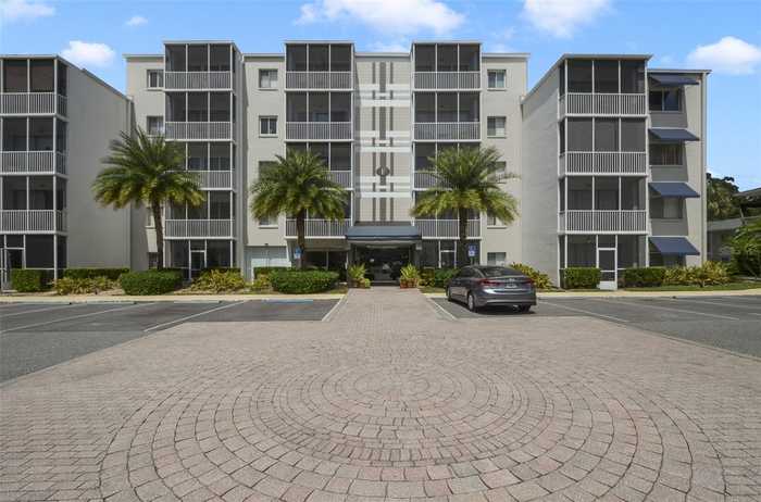 photo 1: 1100 DELANEY AVENUE Unit F308, ORLANDO FL 32806