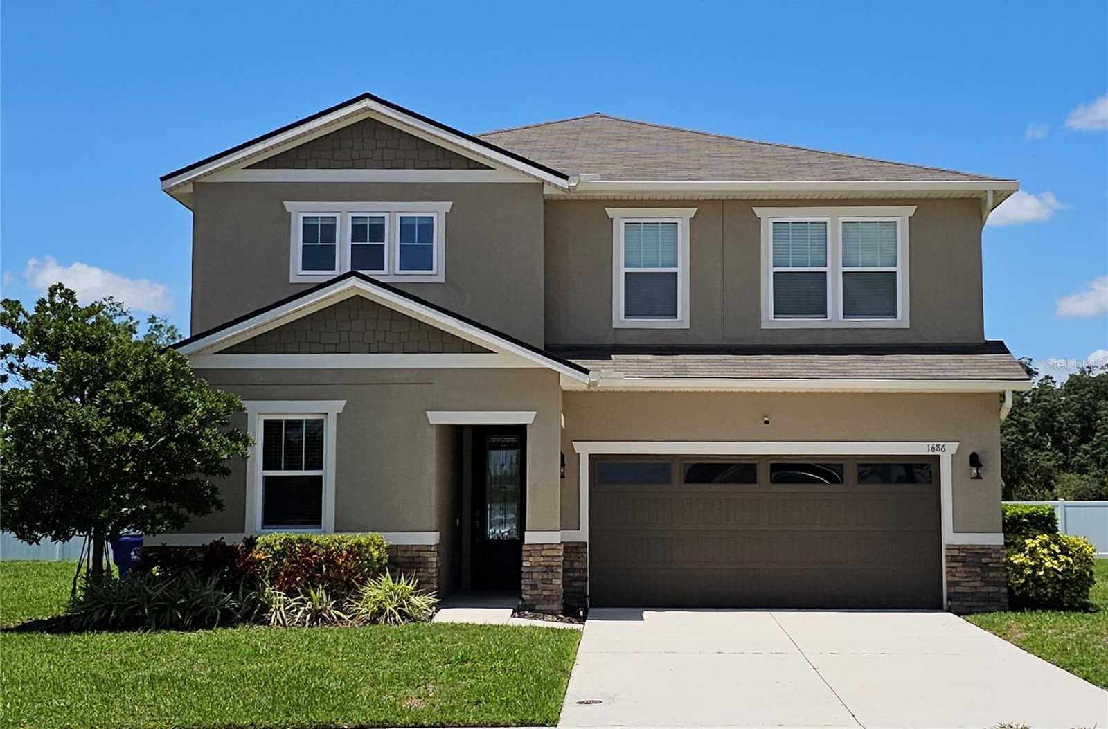 photo 1: 1686 GENTLE BREEZE DRIVE, SAINT CLOUD FL 34771