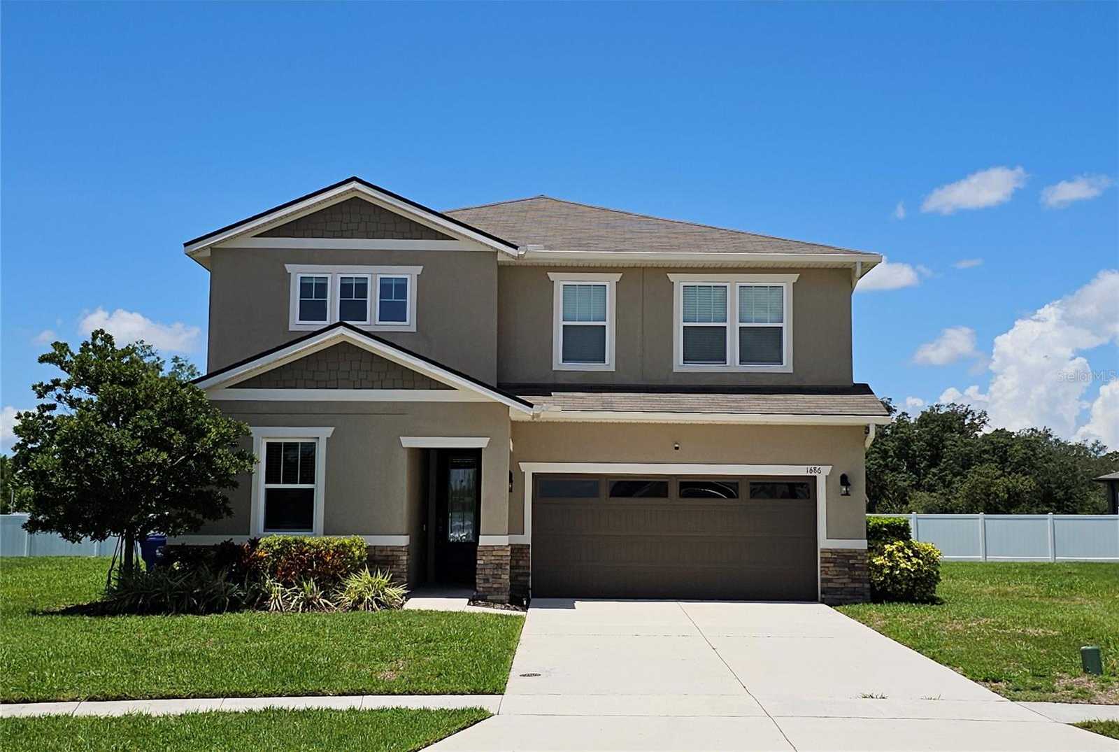 photo 2: 1686 GENTLE BREEZE DRIVE, SAINT CLOUD FL 34771