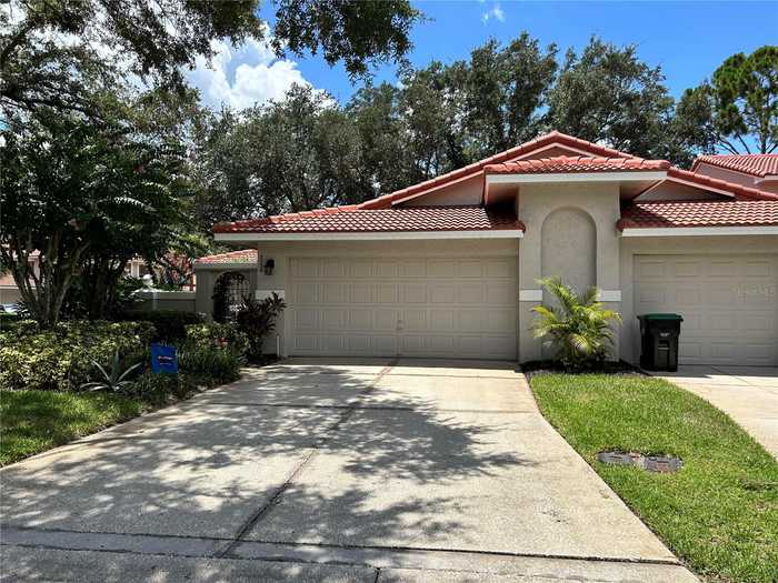 photo 1: 7738 SUNDIAL LANE, ORLANDO FL 32819