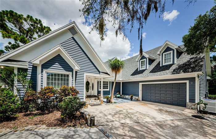 photo 1: 1142 WEYBRIDGE LN, DUNEDIN FL 34698