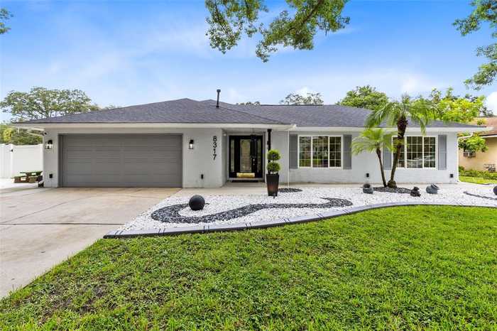 photo 1: 8317 SUGARMILL STREET, ORLANDO FL 32819