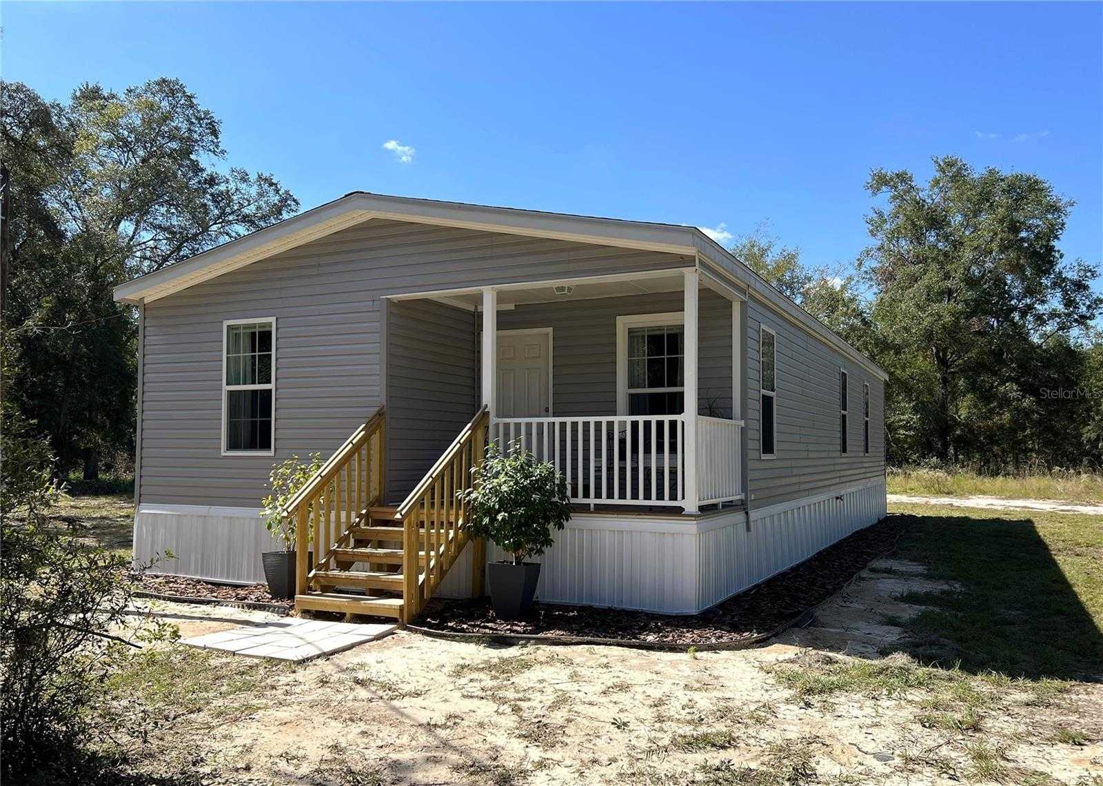 photo 1: 7630 NE 127TH PLACE, BRONSON FL 32621