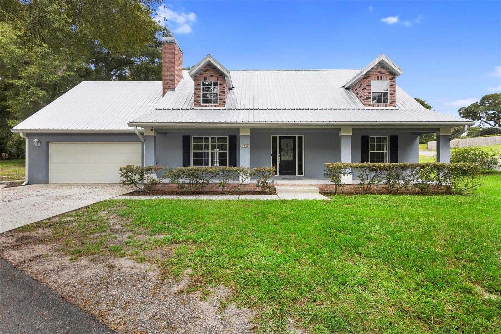 photo 1: 2530 COUNTRY SQUIRE LANE, DELAND FL 32720