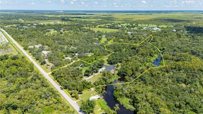 photo 2: 33750 WASHINGTON LOOP ROAD, PUNTA GORDA FL 33982