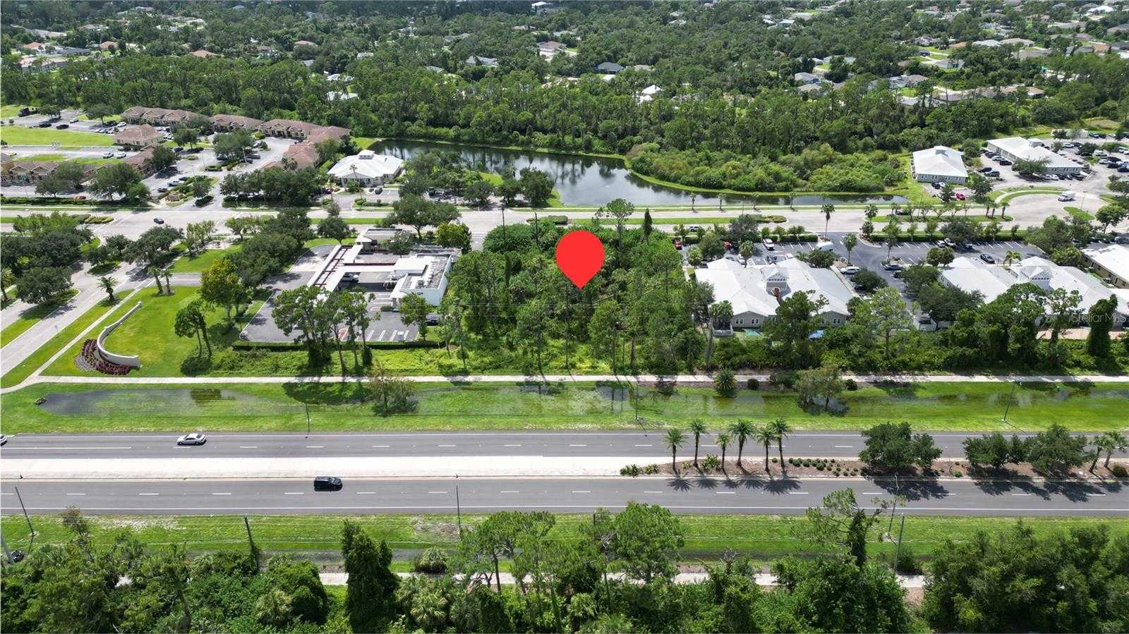 photo 1: 2800 BOBCAT VILLAGE CENTER ROAD, NORTH PORT FL 34288