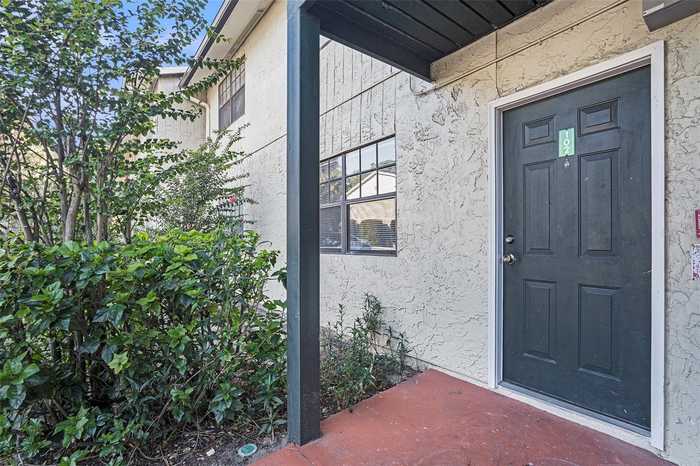 photo 1: 12413 OAK CEDAR PLACE Unit 102, TAMPA FL 33612