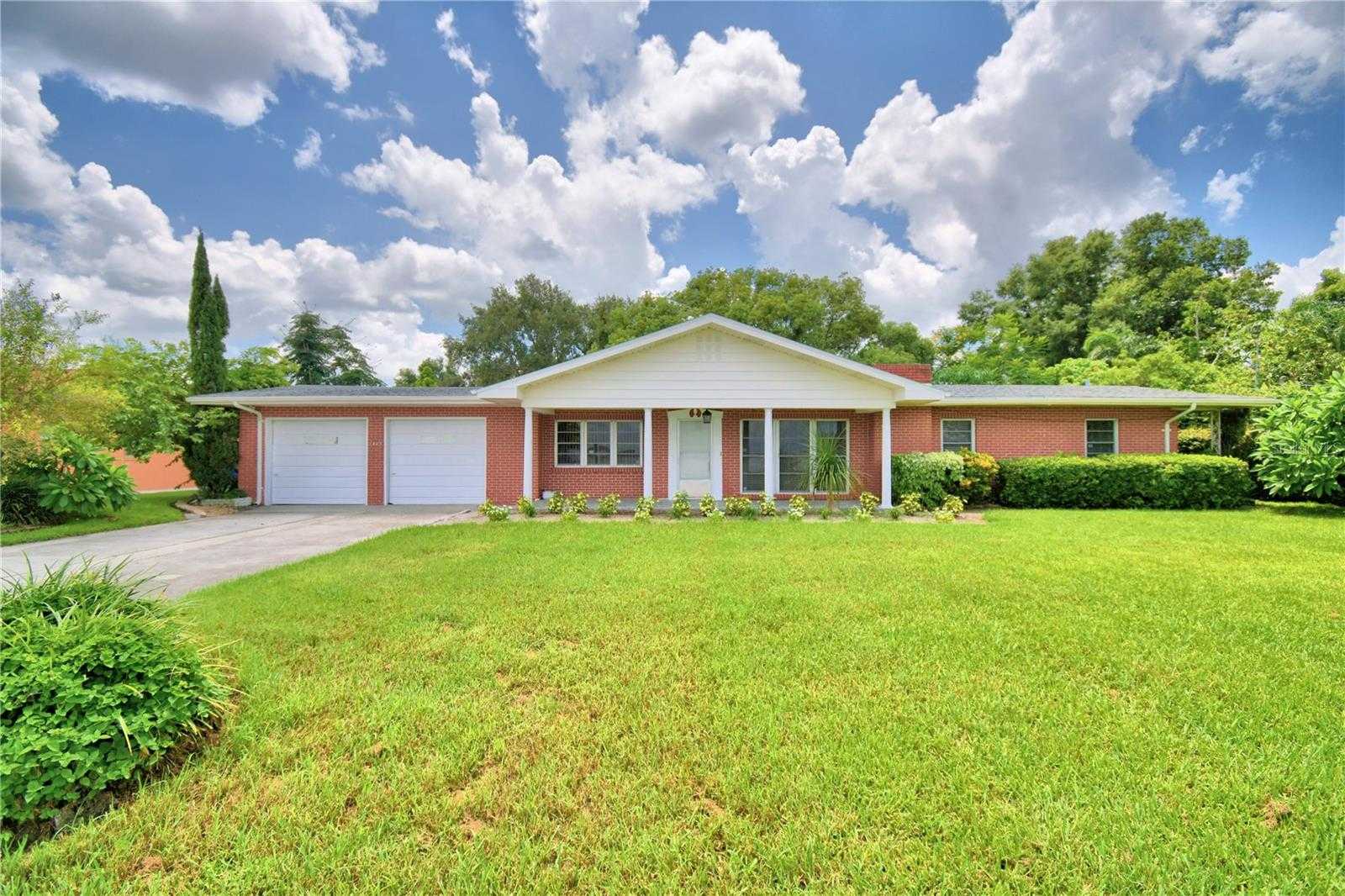 photo 1: 1475 LAKE HOWARD DRIVE SW, WINTER HAVEN FL 33880