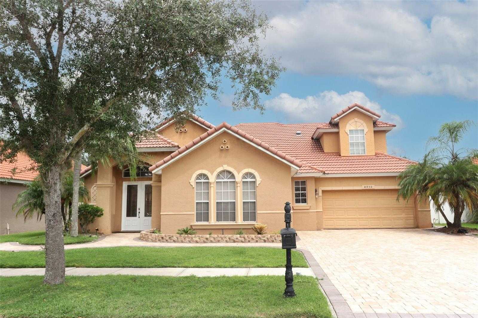 photo 1: 8950 TUSCAN VALLEY PLACE, ORLANDO FL 32825