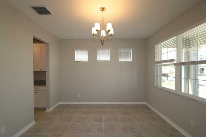 photo 2: 2998 ADAMS CROSS DRIVE, ZEPHYRHILLS FL 33540