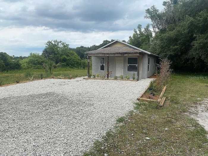 photo 1: 15098 NE 35TH AVENUE ROAD, CITRA FL 32113