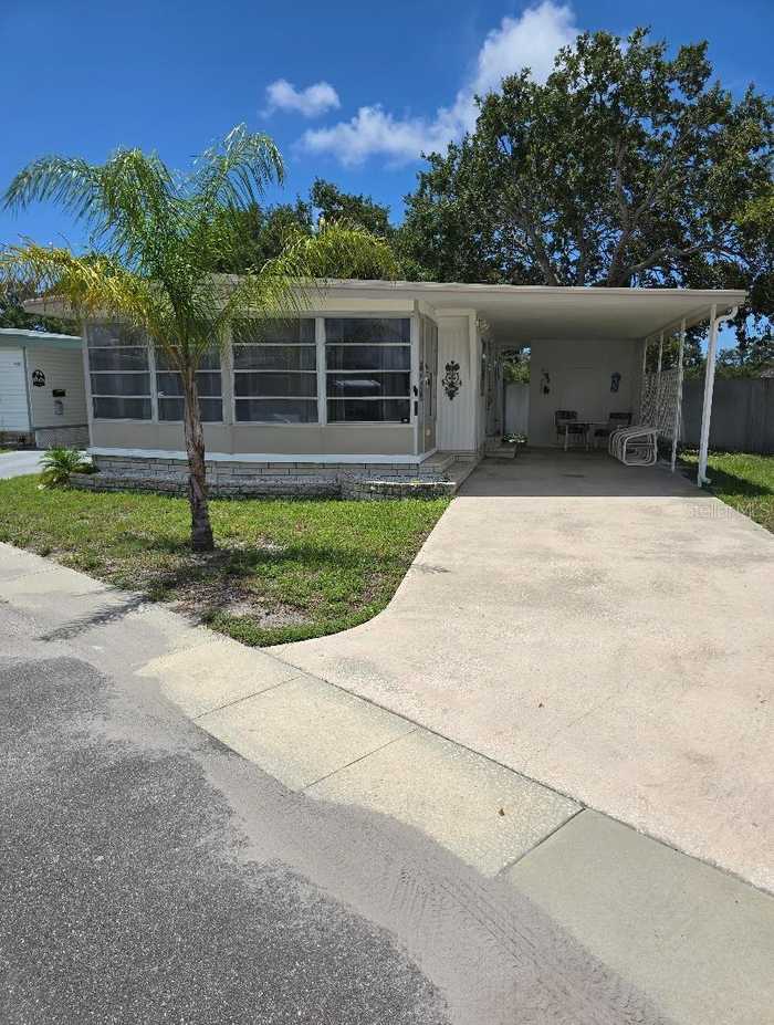 photo 1: 7901 40TH AVENUE N Unit 32, SAINT PETERSBURG FL 33709