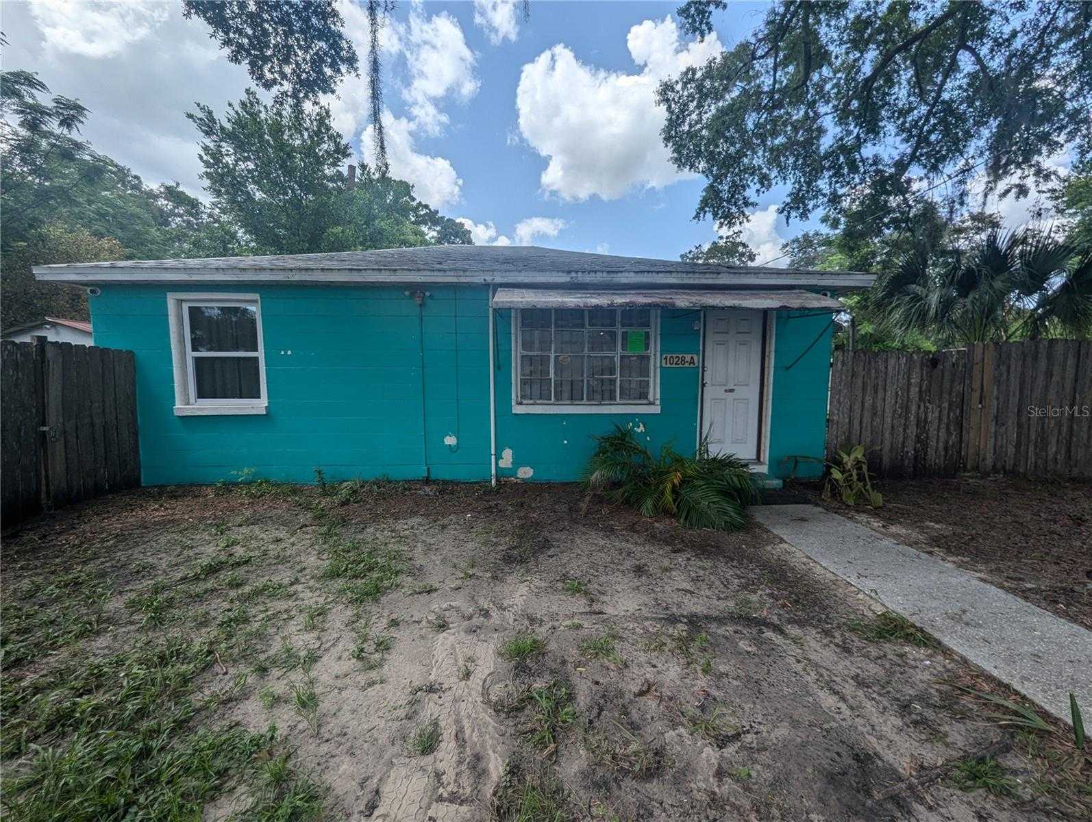 photo 1: 1028 E 93RD AVENUE Unit A, TAMPA FL 33612