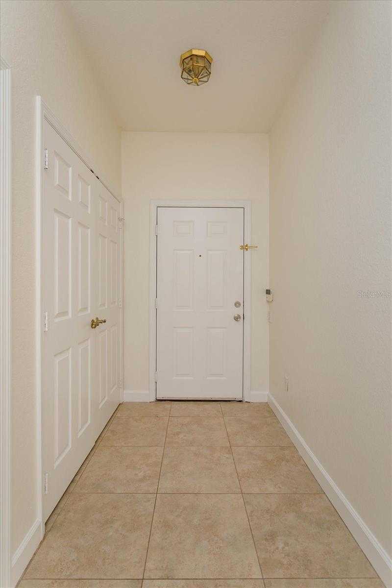 photo 2: 13500 TURTLE MARSH LOOP Unit 820, ORLANDO FL 32837