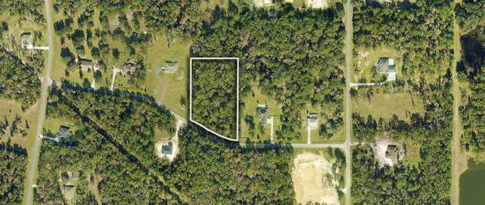 photo 1: NW 145TH ST., WILLISTON FL 32696