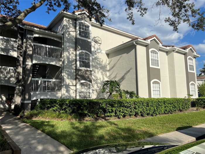 photo 1: 14025 FAIRWAY ISLAND DRIVE Unit 317, ORLANDO FL 32837