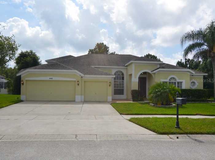 photo 1: 10409 MEADOW CROSSING DRIVE, TAMPA FL 33647