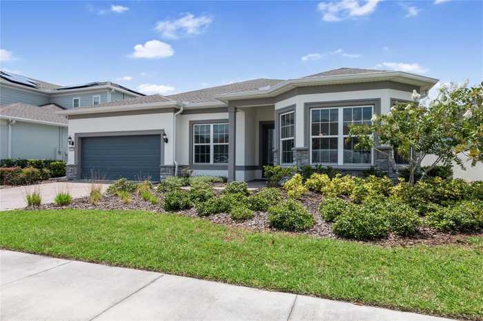 photo 1: 13828 TYBEE BEACH LANE, ORLANDO FL 32827