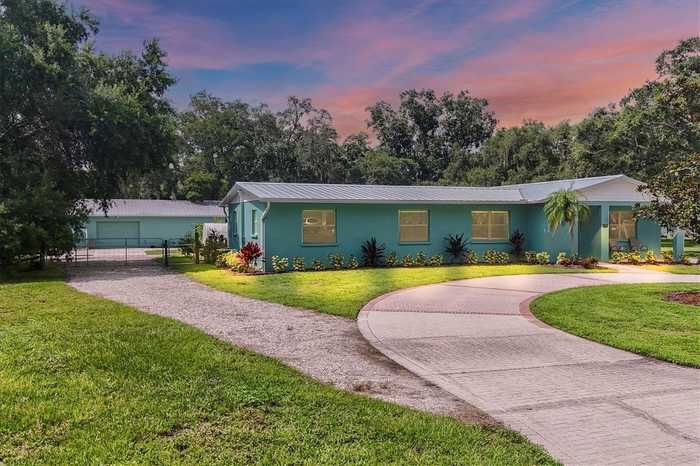 photo 1: 6018 47TH AVENUE E, BRADENTON FL 34203