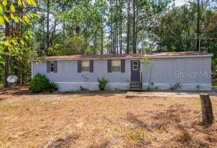 photo 7: 91 NE 139TH TERRACE, WILLISTON FL 32696