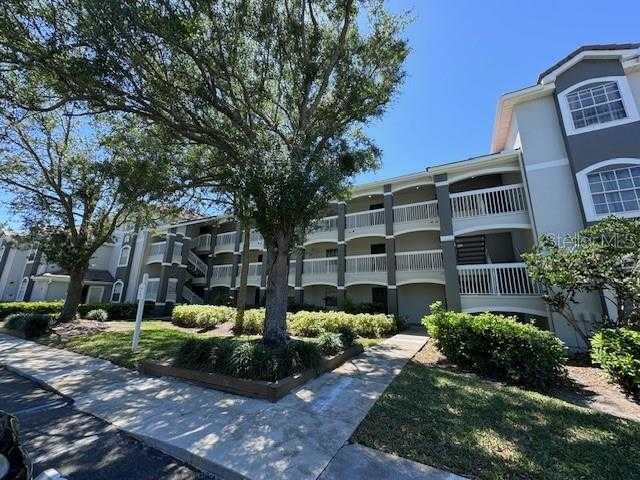 photo 1: 13941 FAIRWAY ISLAND DRIVE Unit 721, ORLANDO FL 32837