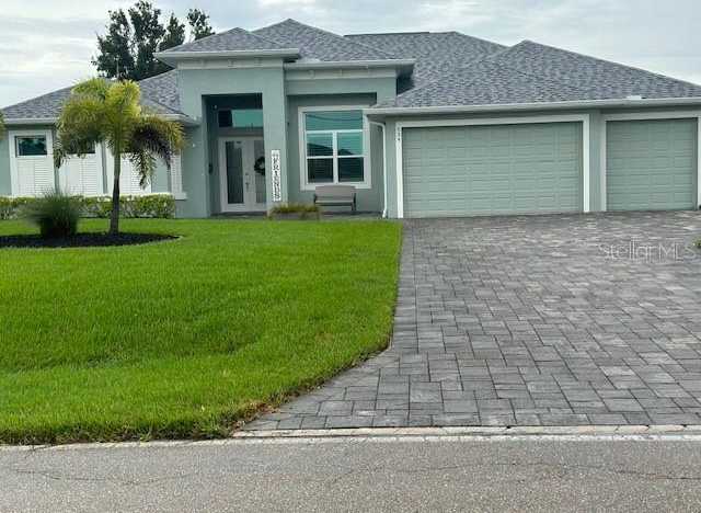 photo 1: 534 BOUNDARY BOULEVARD, ROTONDA WEST FL 33947