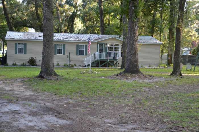 photo 2: 4886 E HIGHWAY 316, CITRA FL 32113