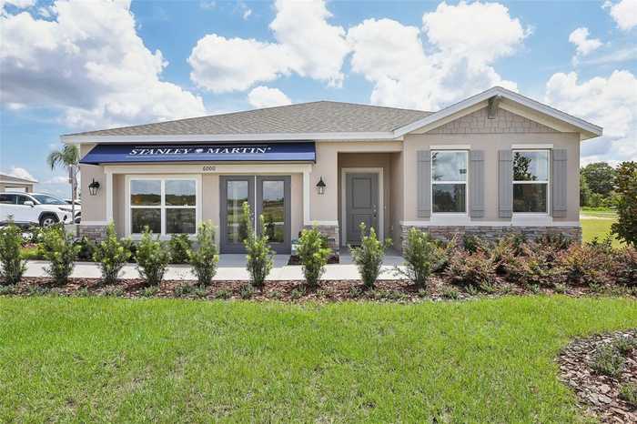 photo 2: 1832 BLUE LAGOON CIRCLE, MASCOTTE FL 34753