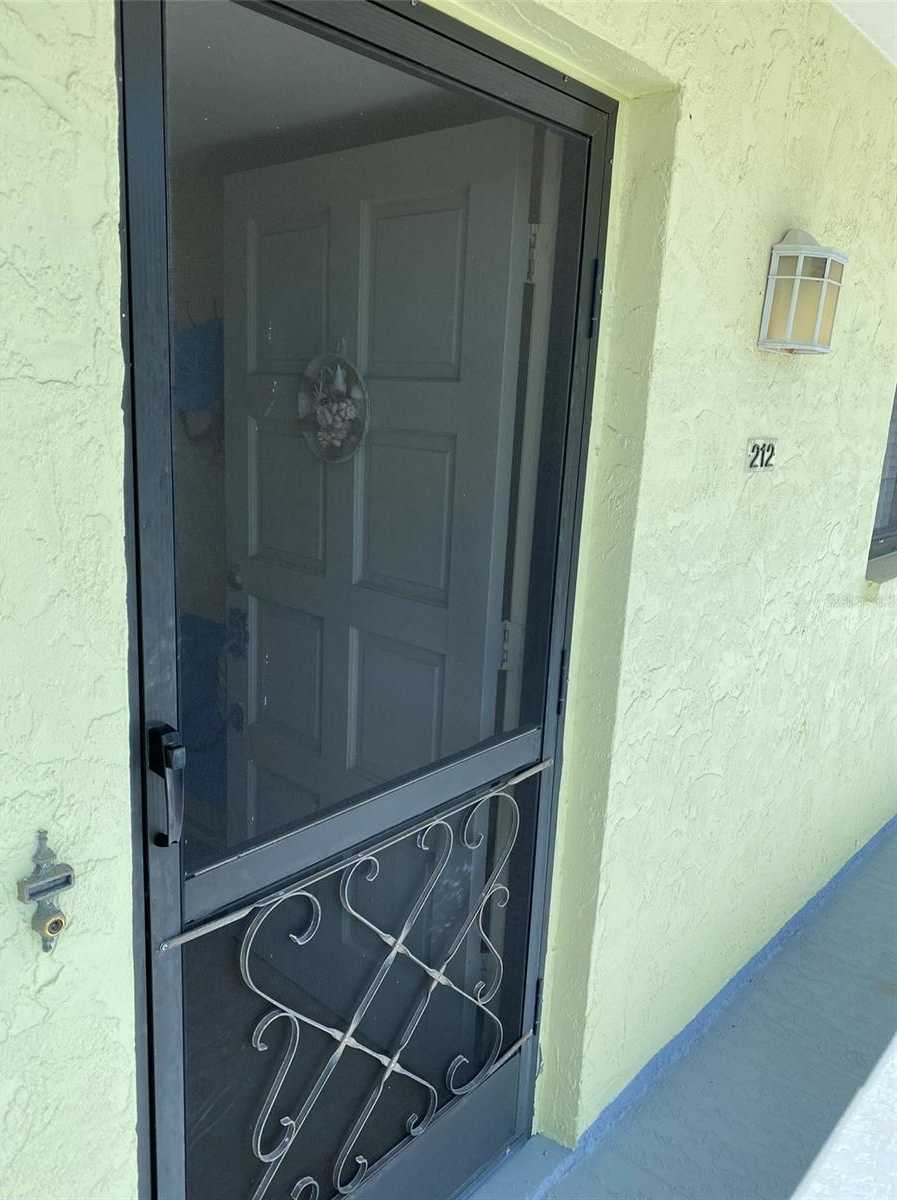 photo 3: 6703 MIDNIGHT PASS ROAD Unit 212, SARASOTA FL 34242