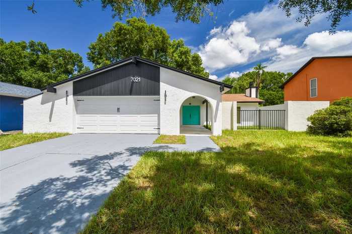 photo 1: 7021 TWELVE OAKS BOULEVARD, TAMPA FL 33634