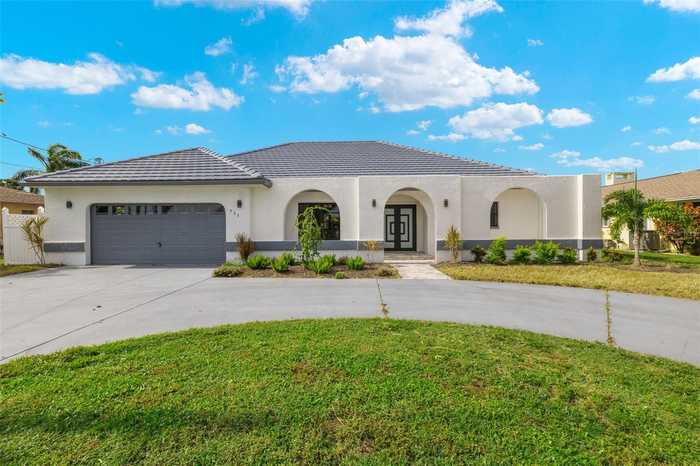 photo 1: 711 SE 33RD TERRACE, CAPE CORAL FL 33904