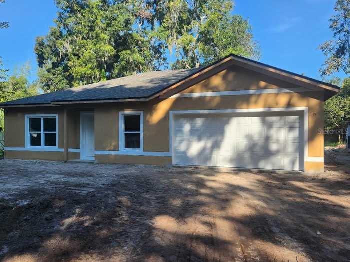 photo 1: 415 SPRING GARDEN AVENUE, DE LEON SPRINGS FL 32130