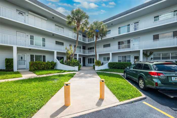 photo 1: 2001 WORLD PARKWAY BOULEVARD Unit 51, CLEARWATER FL 33763