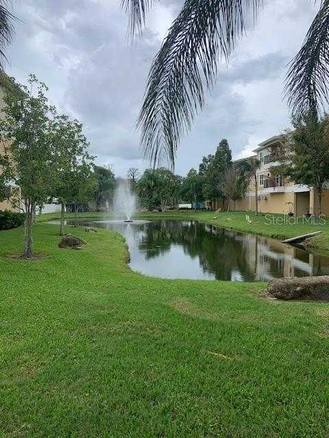 photo 2: 5111 ROYAL PALMS WAY Unit 303, NEW PORT RICHEY FL 34652