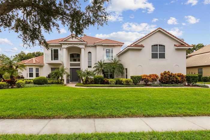 photo 1: 8747 CRESTGATE CIRCLE, ORLANDO FL 32819