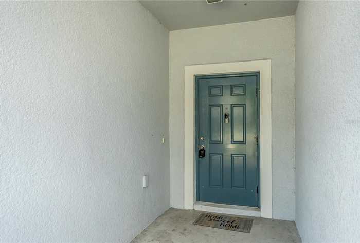 photo 2: 9741 PEMBROOKE PINES DRIVE, SUN CITY CENTER FL 33573