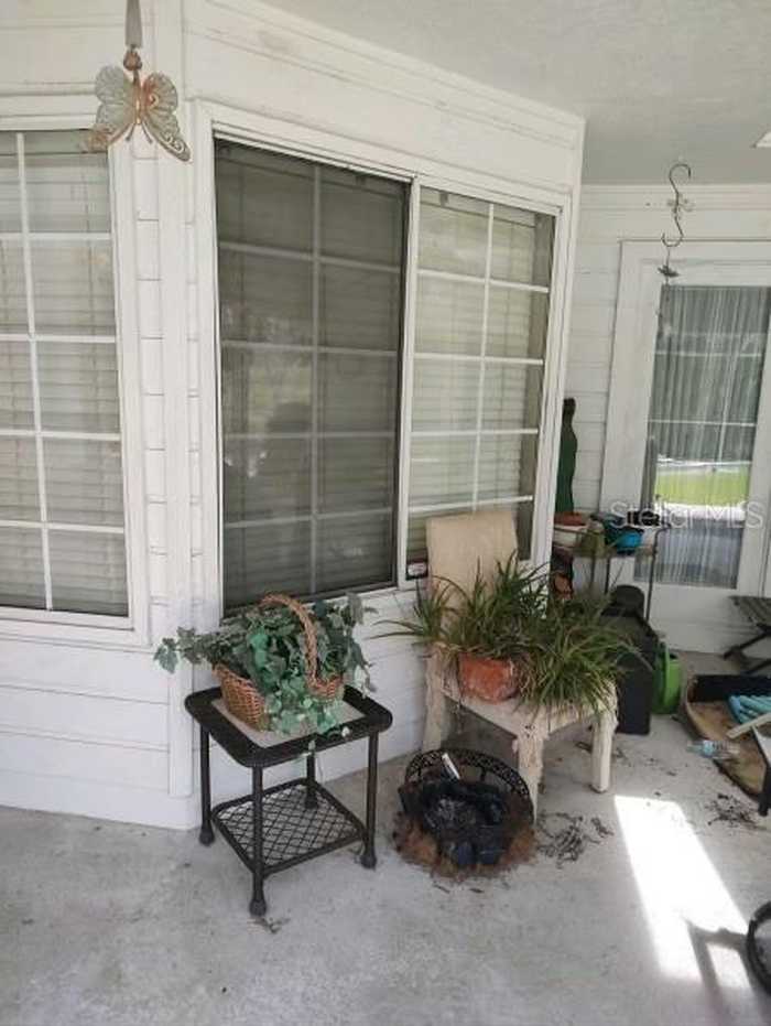 photo 1: 6130 NE 61ST AVENUE ROAD, SILVER SPRINGS FL 34488